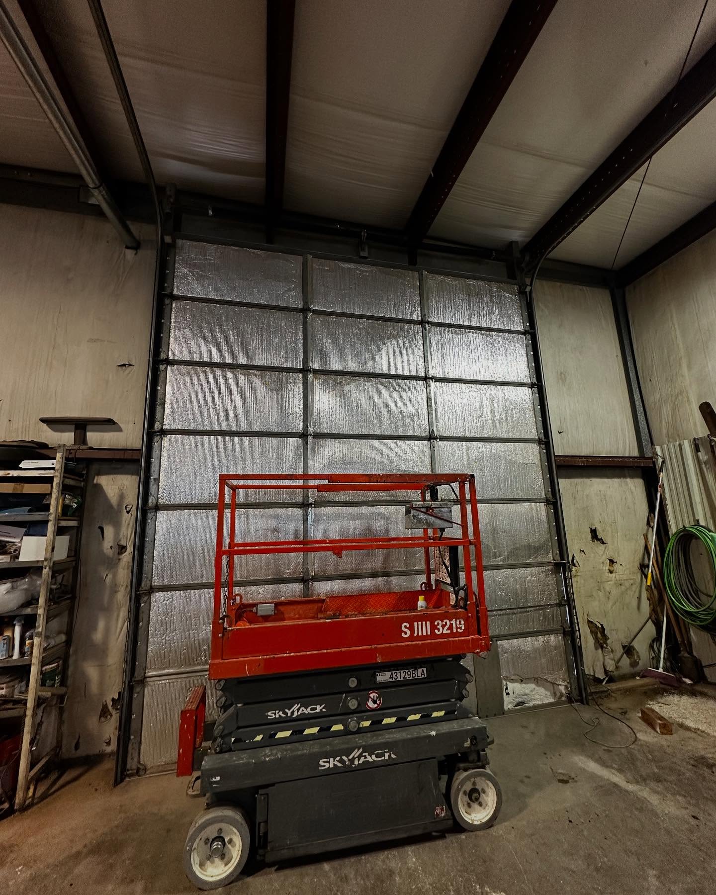 Emergency garage door repair service in Wray, CO - Broken spring replacement